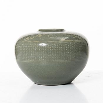 A Korean celadon glazed ceramic vase, 1900s.