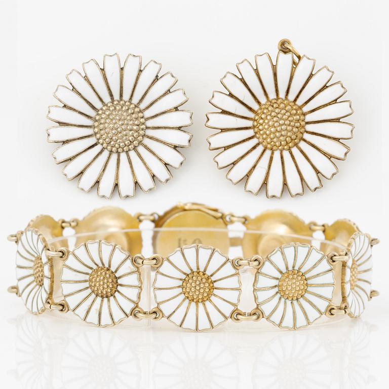 Georg Jensen and A Michelsen "Daisy" a bracelet, a pendant, and a brooch silver gilt and enamel.
