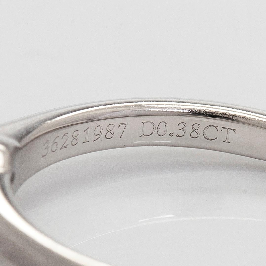 Tiffany & Co, a platinum solitaire ring with a brilliant-cut diamond.