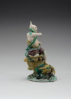 A famille verte figurine of a sea deamon, Qing dynasty, Kangxi (1662-1722).