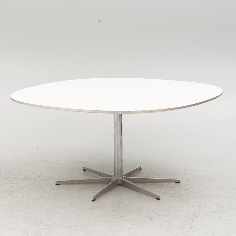 Arne Jacobsen, Bruno Mathsson & Piet Hein, a 'Super circle' dining table, Fritz Hansen, Denmark, 2007.