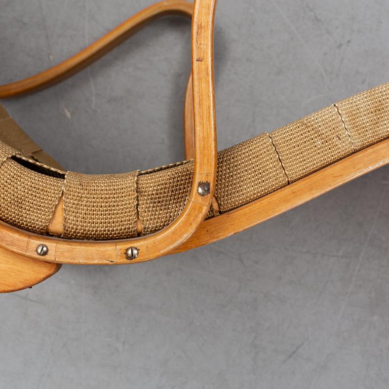 A lounge chair by Bruno Mathsson, mid 20th Century.