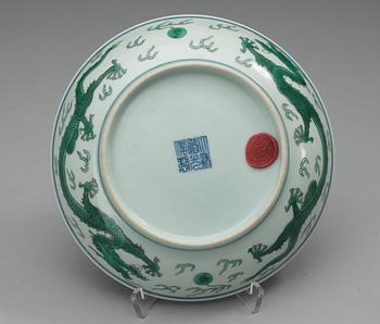 A green glazed dragon dish, Qing dynasty with Daoguangs seal mark and period.