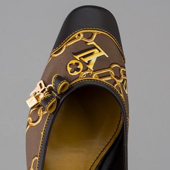 Ballerina shoes by Louis Vuitton.