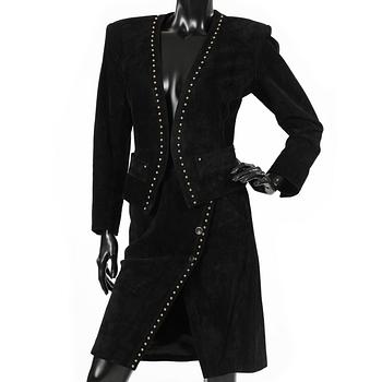 YVES SAINT LAURENT, a two-piece suit consisting of jacket and skirt.