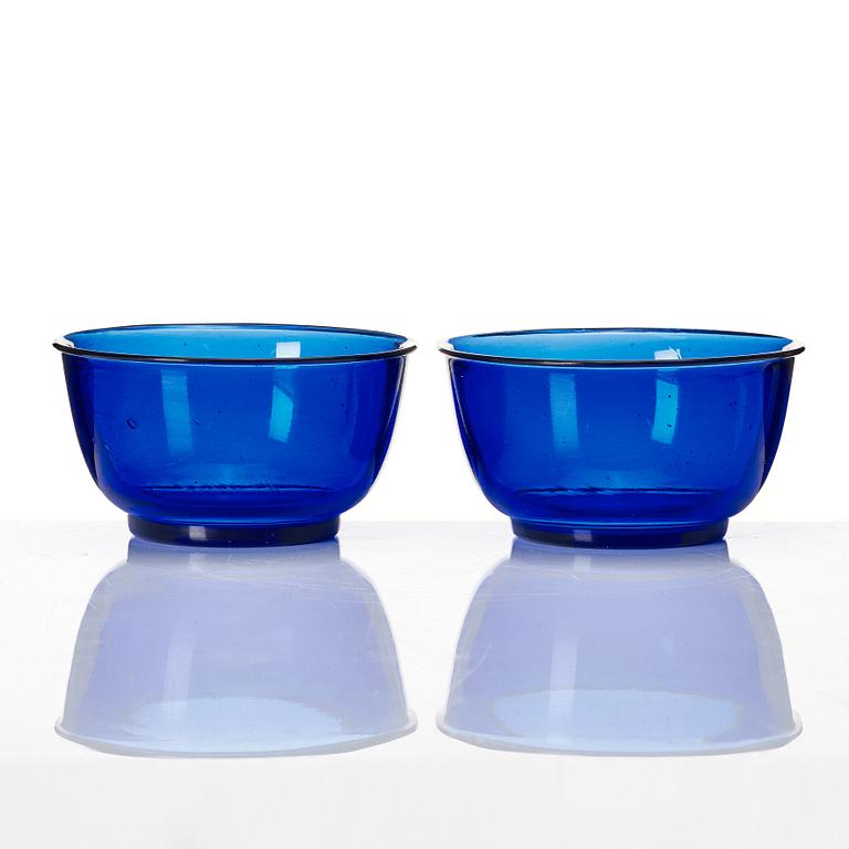 A pair of Chinese blue Beijing glass bowls, 20th century.