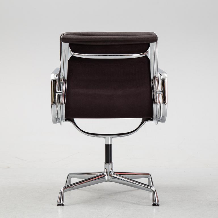 An EA 208 Soft Pad swivel chair by Charles and Ray Eames for Vitra, dated 2010.