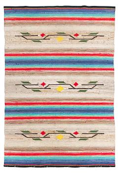 A mid-20th century rag rug, circa 270 x 180 cm.