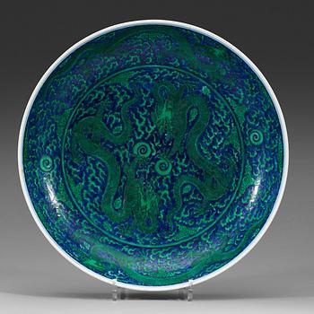 A large green enamelled blue and white dragon dish, probably late Qing dynasty with Kangxi's six character mark.