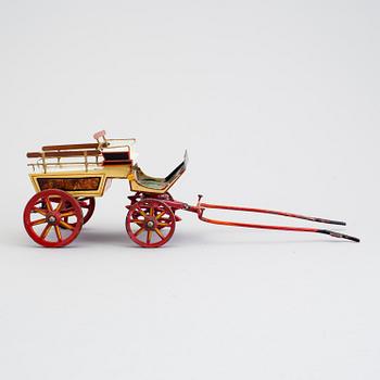 A painted metal horse carriage Germany c 1890-1900.