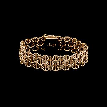 ARMBAND, X-länk med stav, 18K guld, ca 50g.