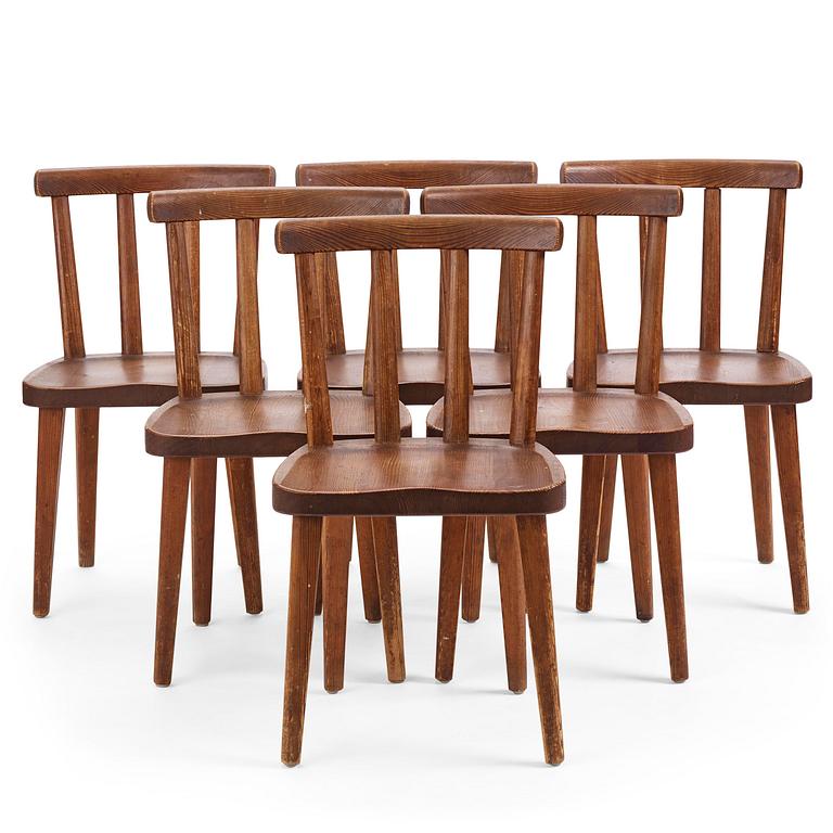 Axel Einar Hjorth, a set of six stained pine "Utö" chairs, Nordiska Kompaniet, Sweden, 1930s.