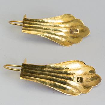 A pair of brass wall scones by Lars Holmström, Arvika.