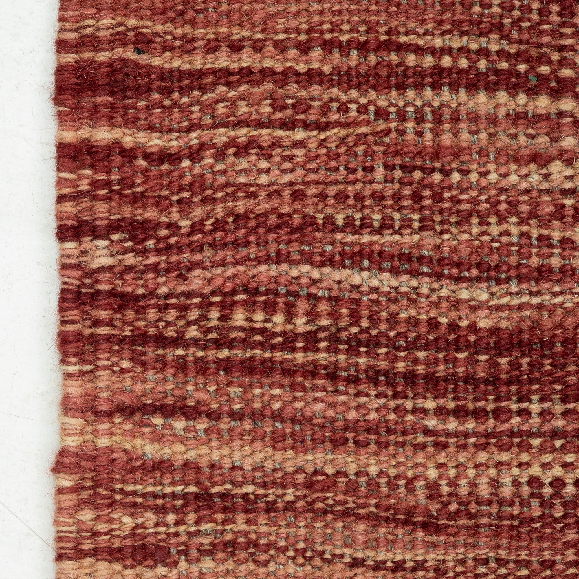 A kilim carpet, 304 x 203 cm.