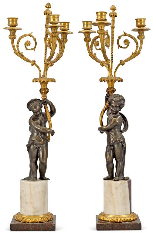 A pair of French 19th century three-light candelabra.