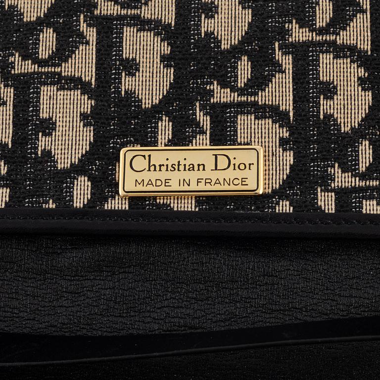 Christian Dior, handbag and wallet.