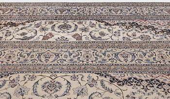 A Nain part silk carpet, 407 x 304 cm.