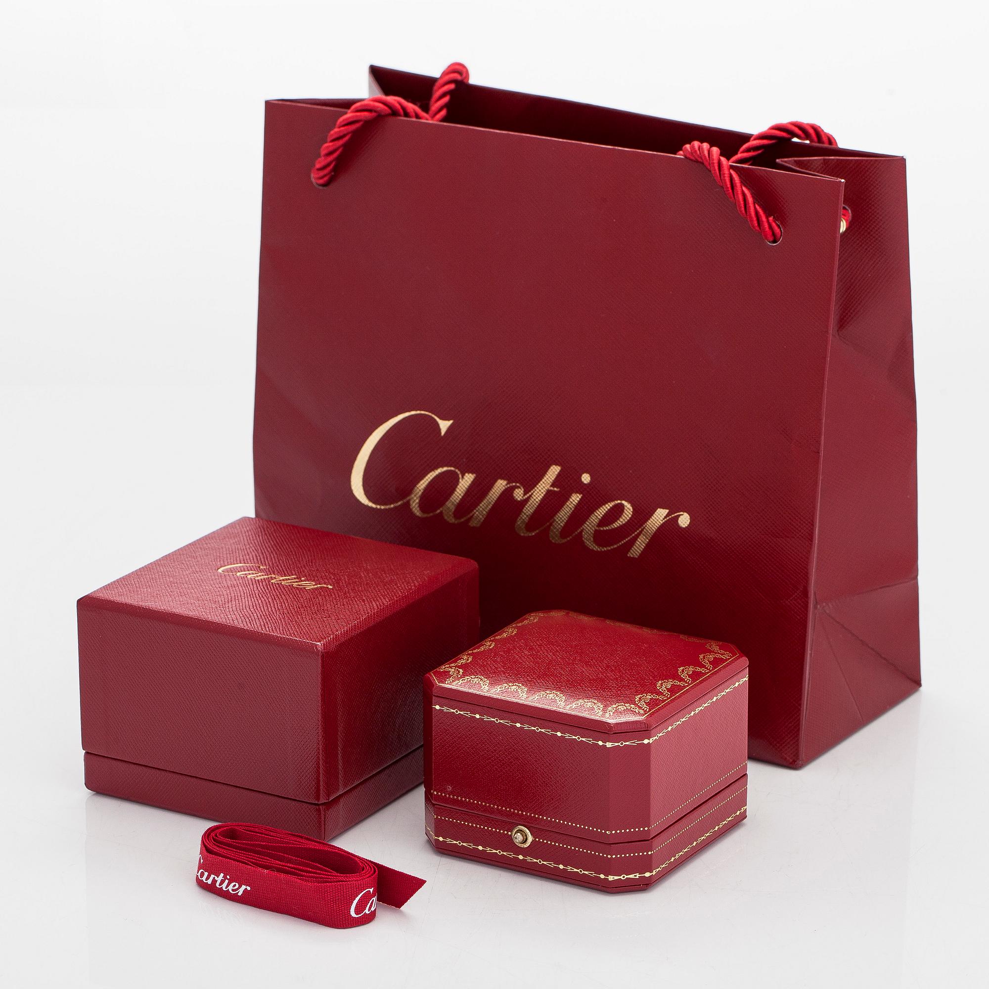 Cartier, a platinum and brilliant-cut diamond eternity ring.