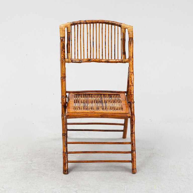 A Chinese spotted bamboo folding chair, late Qing dynasty, circa 1900.