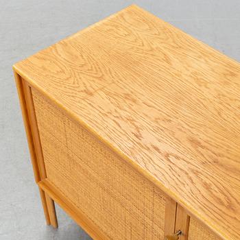 An oak and rattan sideboard by Alf Svensson for Bjästa snickerifabrik, 1960's.