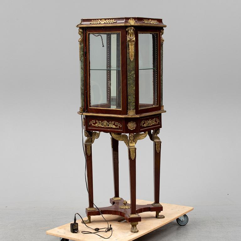 An Empire style cabinet, mid 20th Century.