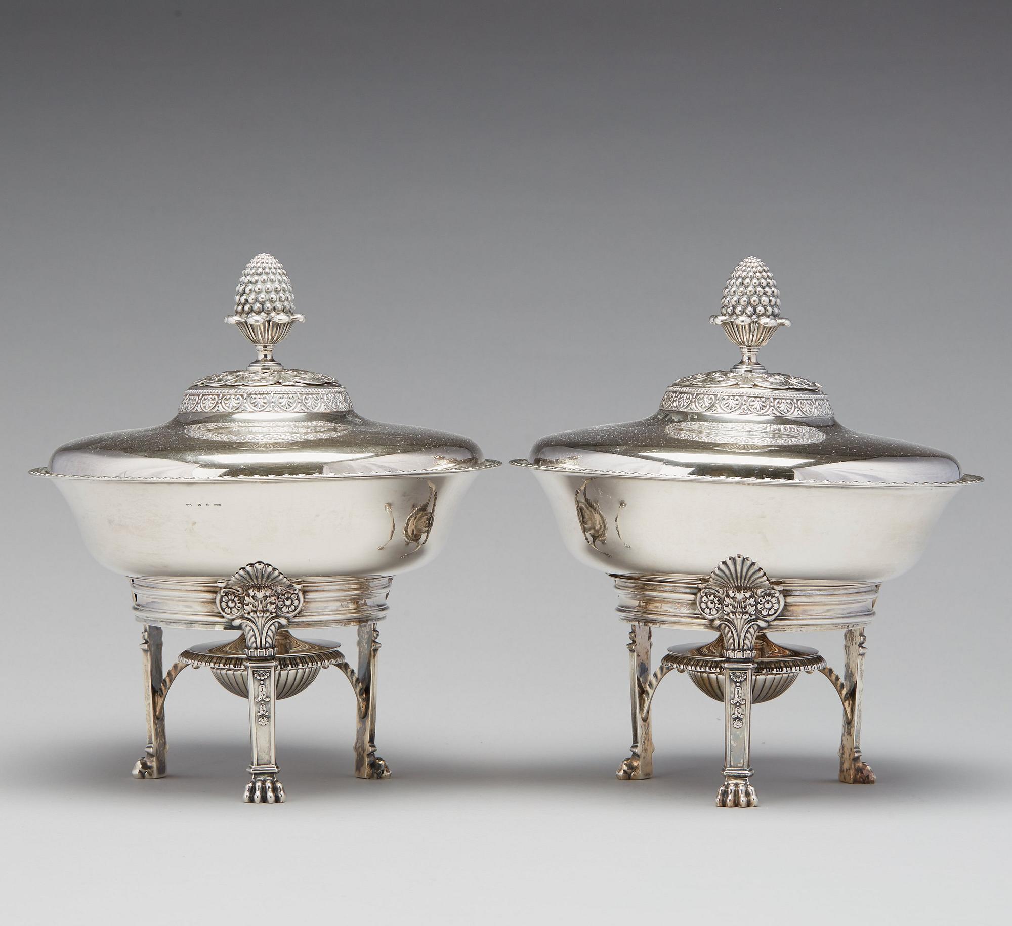 A pair of Swedish Empire silver tureens on stand, mark of Adolf Zethelius, Stockholm 1830.