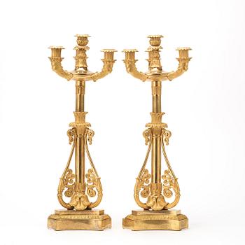 A pair of French Louis Philippe 19th century gilt bronze candelabra.