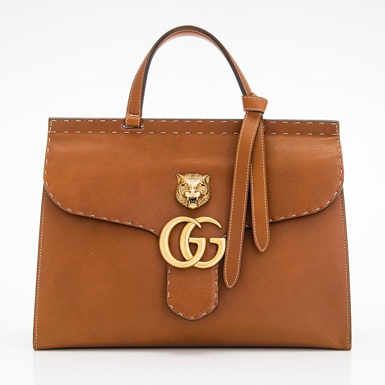 Gucci, a 'GG Marmont' leather bag.