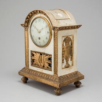 A Swedish late gustavian table clock, ca 1800.