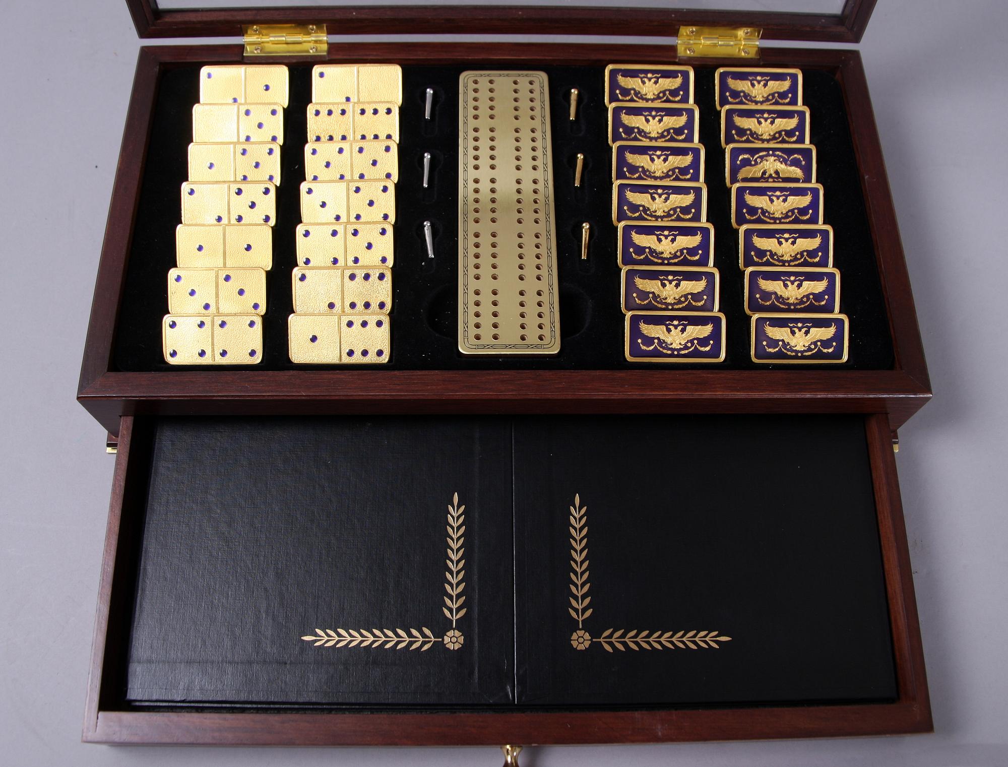 DOMINOSPEL, 22 karats förgyllning. House of Fabergé.