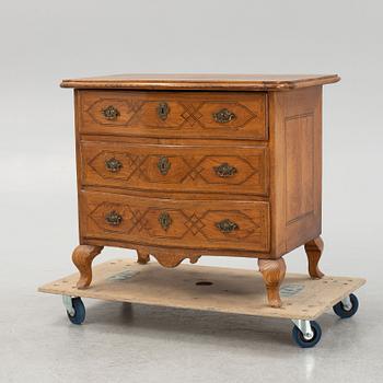 A late Baroque chest of drawers, 18th Century.