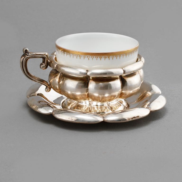 MOCCAKOPPSHÅLLARE, 12 st, silver, 1900-talets första hälft, vikt 1596 g.