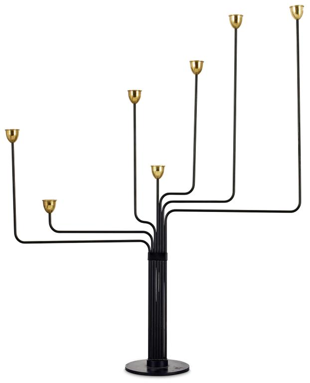 A Piet Hein black lacquered metal and brass candelabrum, 1950-60's.