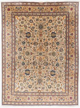 A signed Keshan carpet of Shah Abbas design, c 428 x 320 cm.