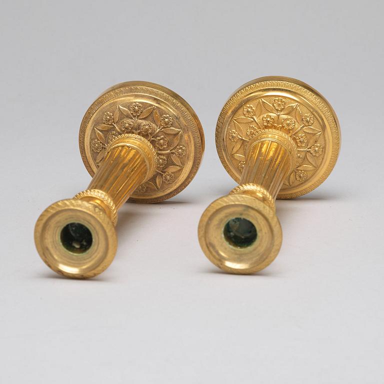 A pair of Empire-style candlesticks, ca 1900.
