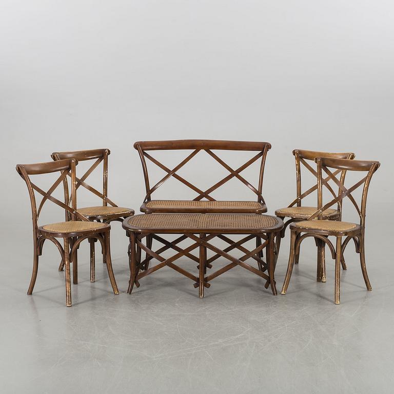 A wooden sofa, a table and four chairs, later part of the 20th century.