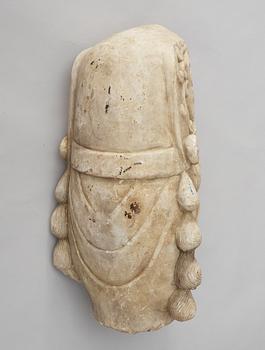 A white stone 20th century buddha head.