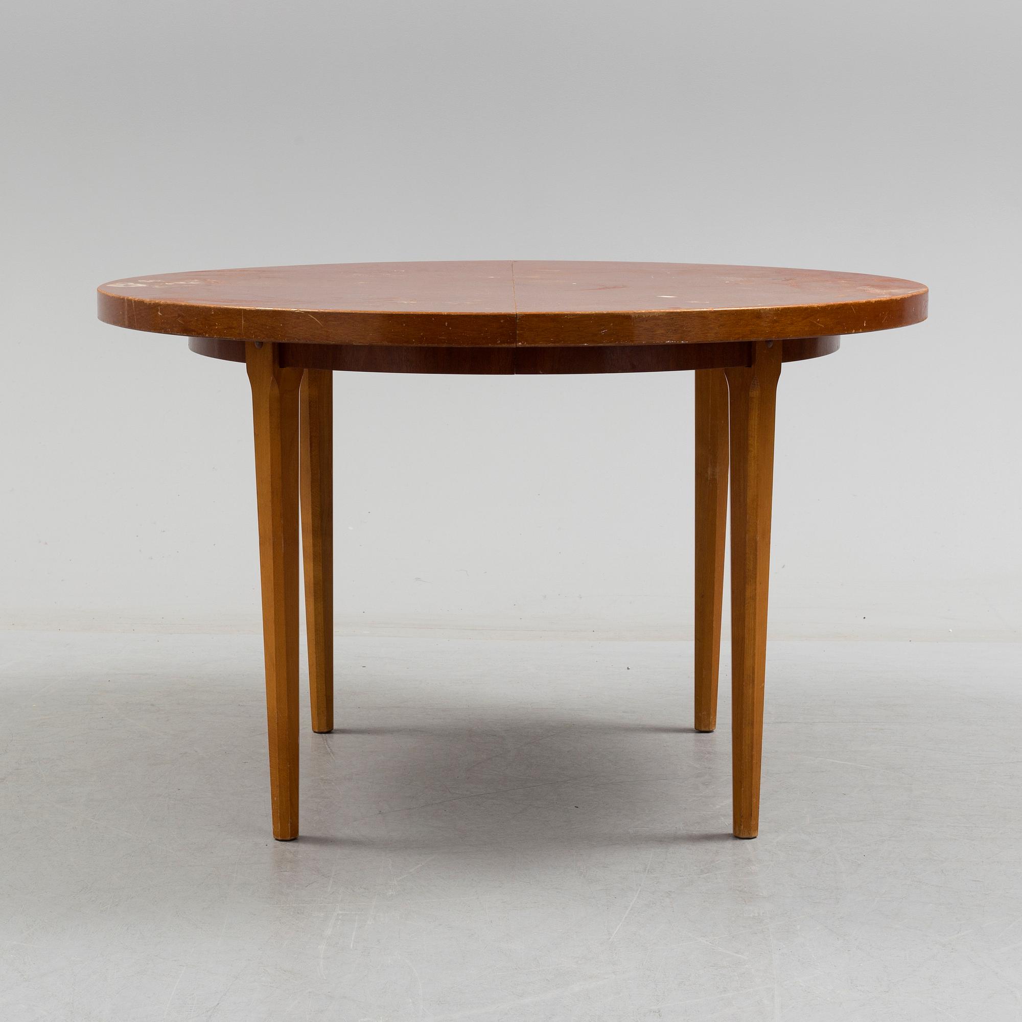 A 1940s mahogany veneer table.