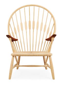 60. A Hans J Wegner ash and teak 'Peacock chair', by PP Møbler, Denmark.