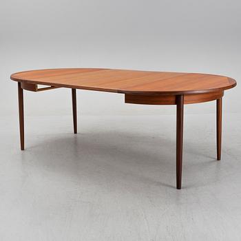 A teak 1950's/60's dining table.