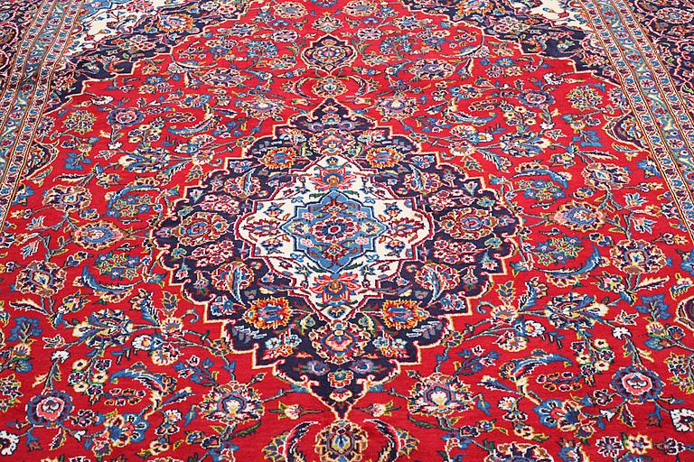 A Keshan rug, 358 x 258 cm.