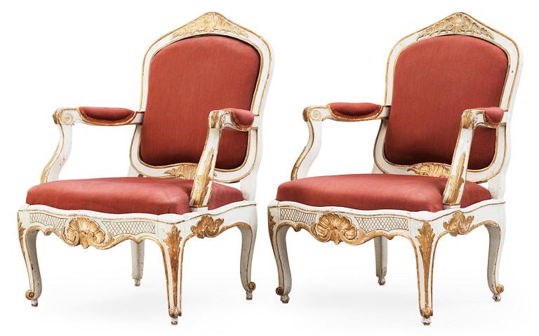 A pair of Rococo 18th century armchairs.