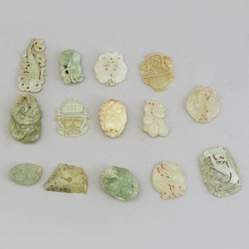 A set of 14 Chinese pendants/charms, some nephrite.