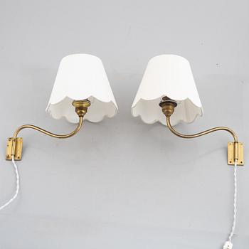 Harald Notini, a pair of model '8568' wall lamps, Arvid Böhlmarks Lampfabrik, 1940's/50's.