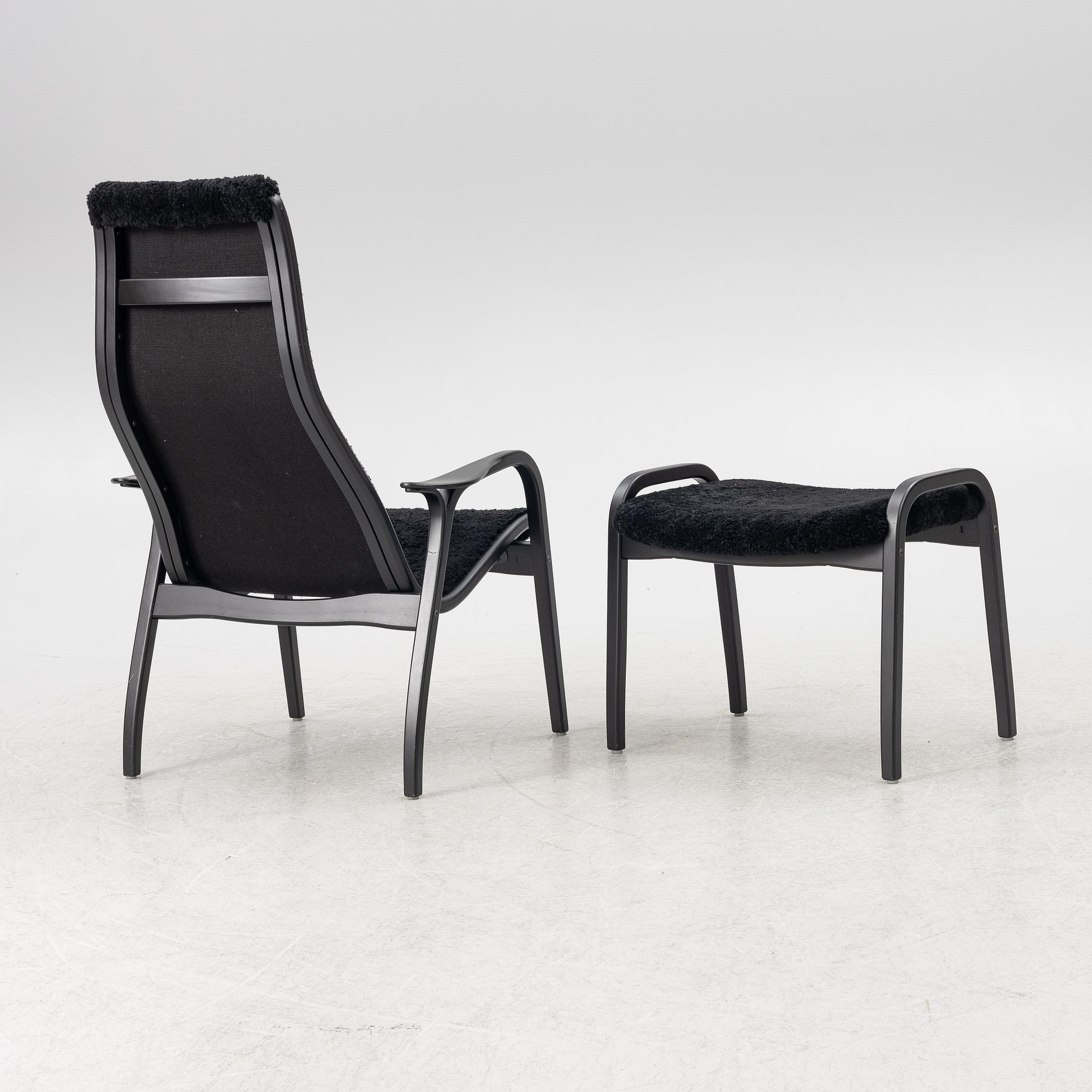 Yngve Ekström, a  'Lamino' easy chair with foot stool, Swedese, 2018.