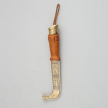 A reindeer horn Sami knife, signed NB.