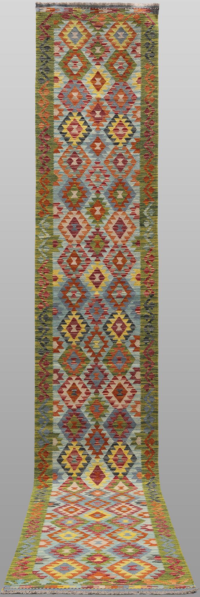 A Kelim runner, c. 492 x 81 cm.
