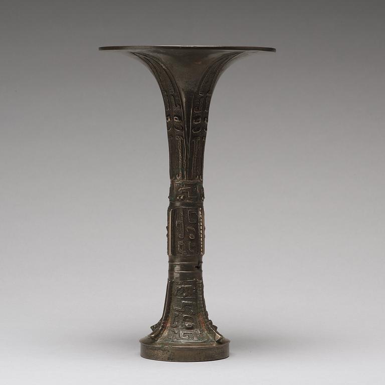 An archaic bronze ritual wine vessel, Gu, possibly late Shang Dynasty.