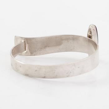 Elis Kauppi, A sterling silver bracelet with a tiger eye. Kupittaan Kulta, Turku 1961.