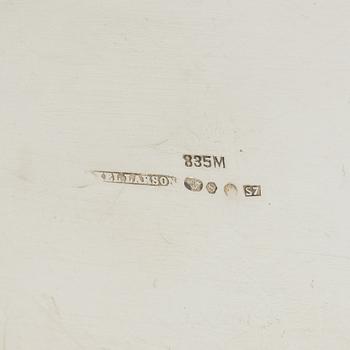 A silver coffee pot, creamer and sugar bowl, import marks of Axel Larson, Helsingborg 1920.